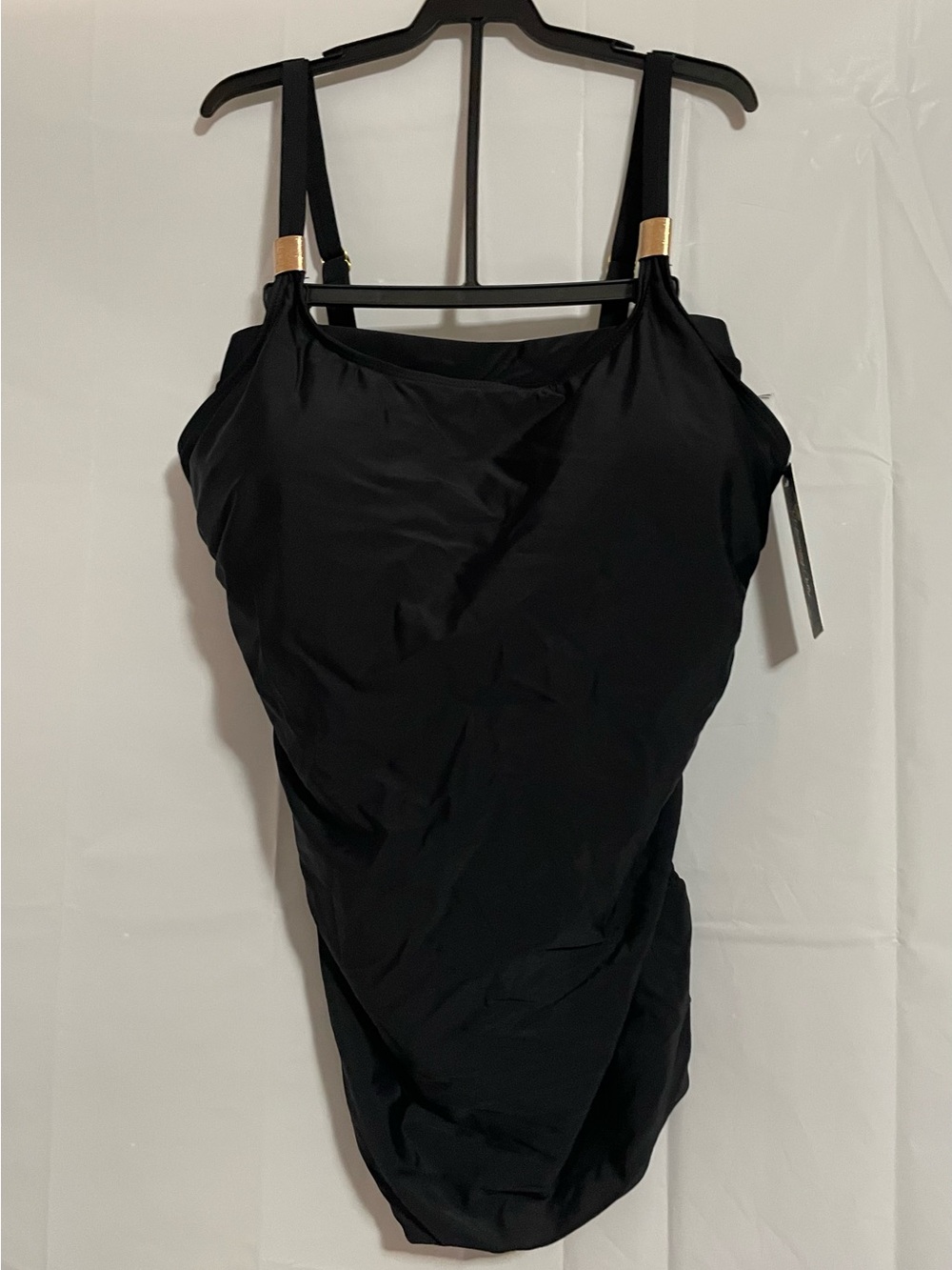 Black One-Piece Swimsuit with Gold Strap Accents